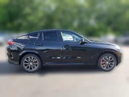 BMW X6 M60i Sports Activity Coupe 2027 — side view