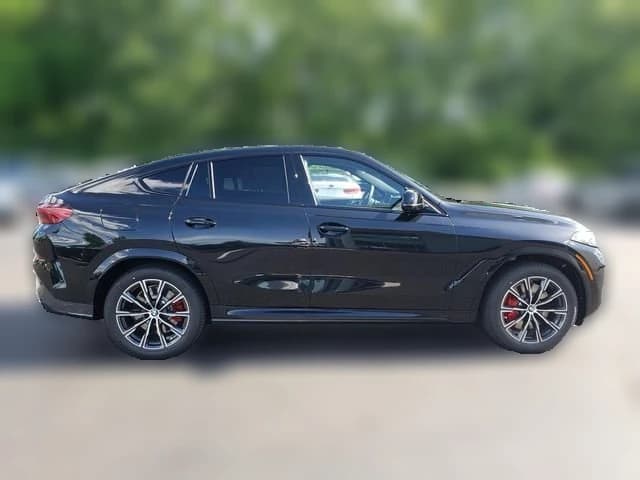 BMW X6 M60i Sports Activity Coupe 2027 — side view