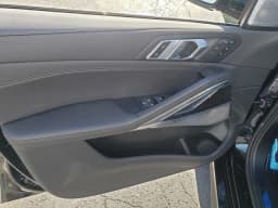 BMW X6 M60i Sports Activity Coupe 2027 — side view