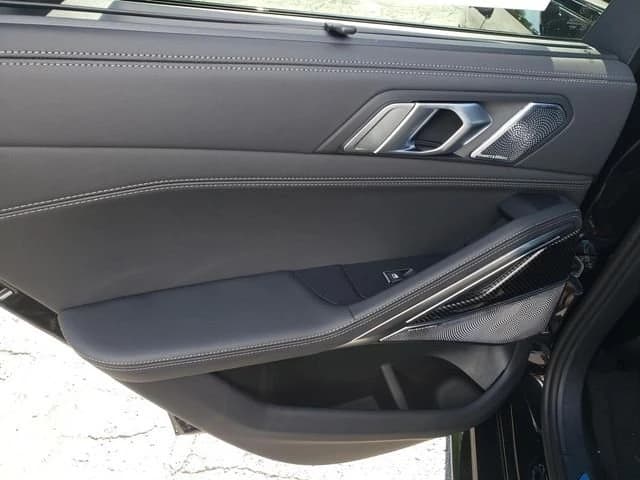 BMW X6 M60i Sports Activity Coupe 2027 — side view