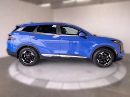 Kia Sportage EX FWD 2026 — side view