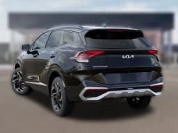 Kia Sportage SX-Prestige AWD 2025 — side view