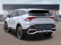 Kia Sportage SX-Prestige AWD 2025 — side view