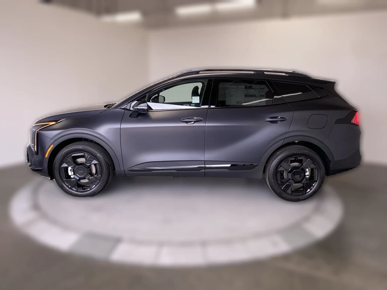 Kia Sportage X-Line AWD 2026 — side view