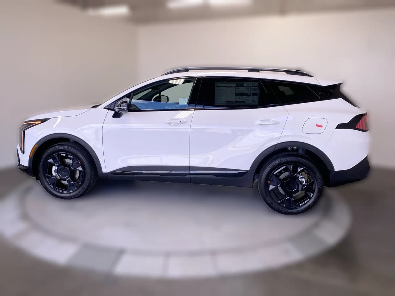 Kia Sportage X-Line AWD 2026 — side view