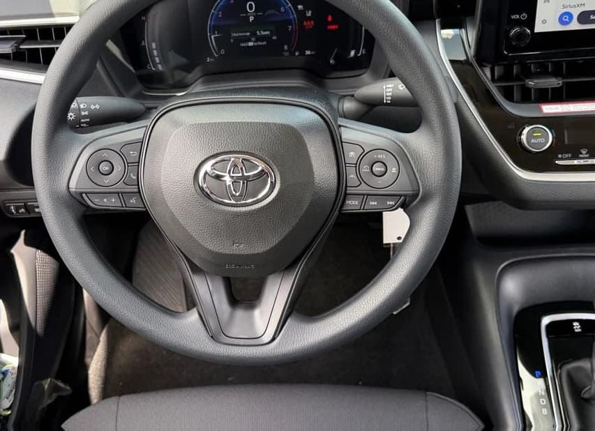 Toyota Corolla LE CVT (Natl) 2026 — side view