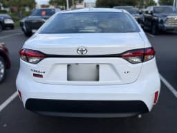 Toyota Corolla LE CVT (Natl) 2027 — side view