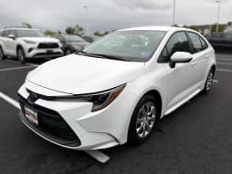 Toyota Corolla LE CVT (Natl) 2026 — side view