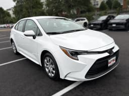 Toyota Corolla LE CVT (Natl) 2026 — side view