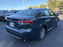 Toyota Corolla LE CVT (Natl) 2027 — side view