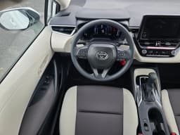 Toyota Corolla LE CVT (Natl) 2026 — side view