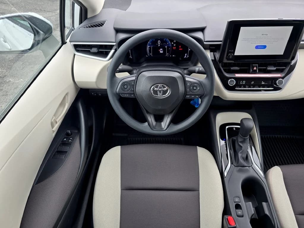 Toyota Corolla LE CVT (Natl) 2026 — side view