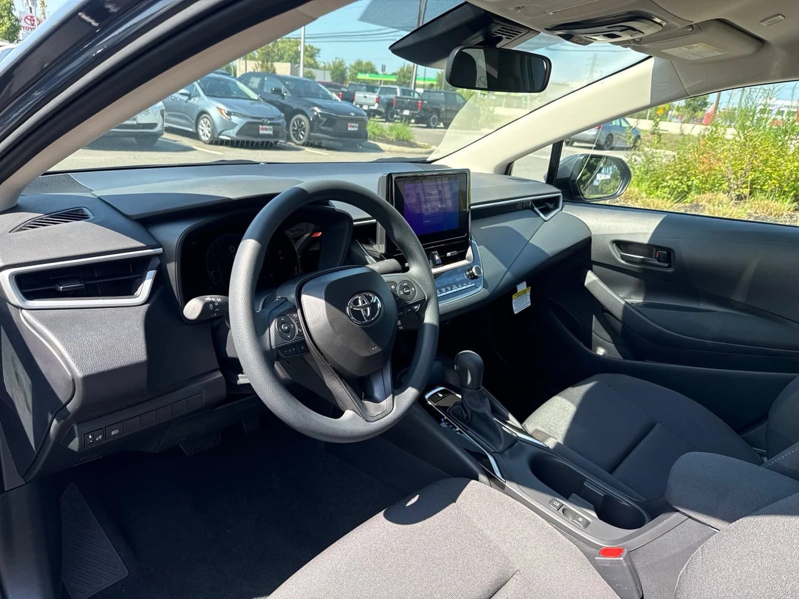 Toyota Corolla LE CVT (Natl) 2026 — side view