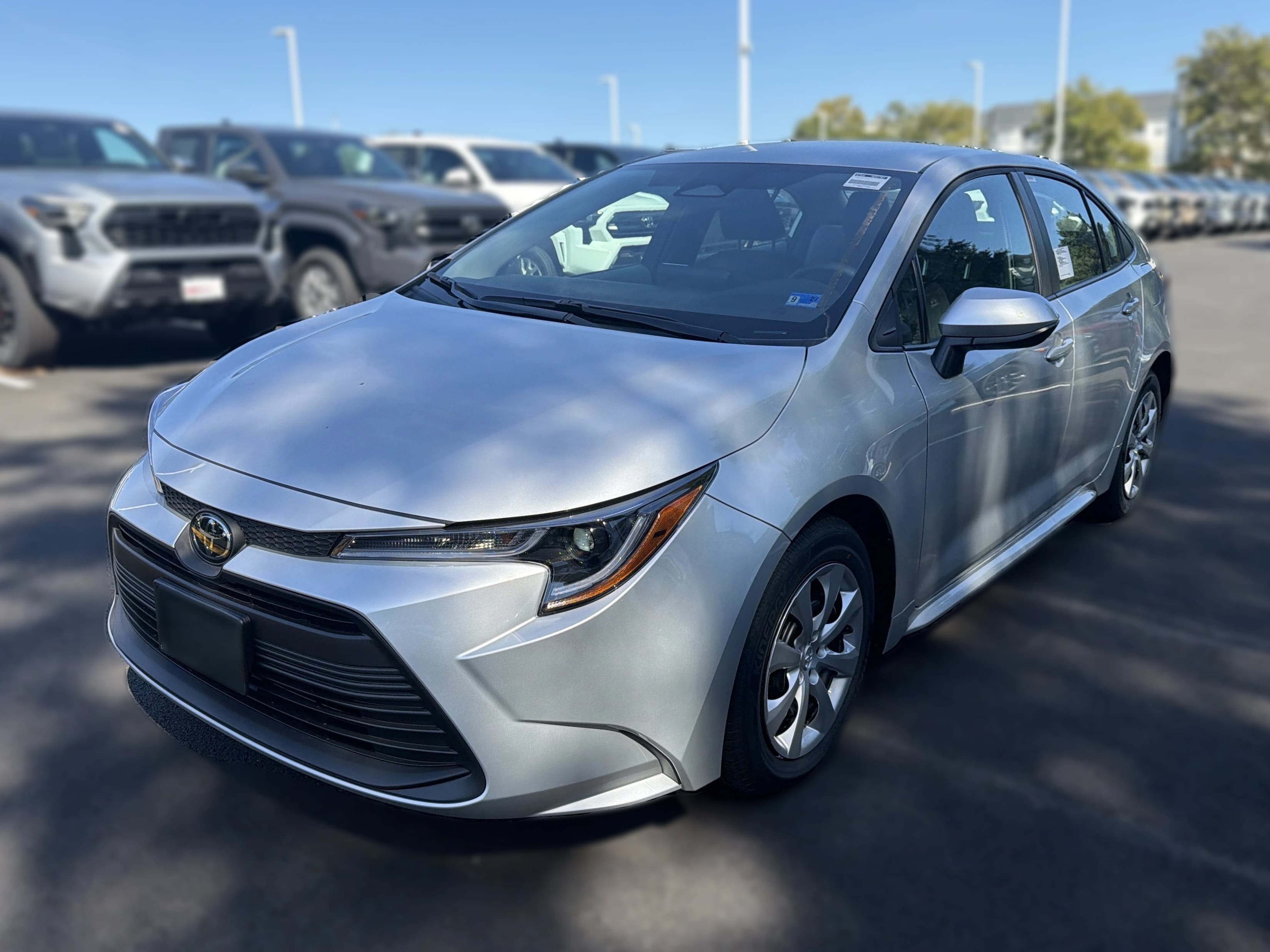 Toyota Corolla LE CVT (Natl) 2026 — side view