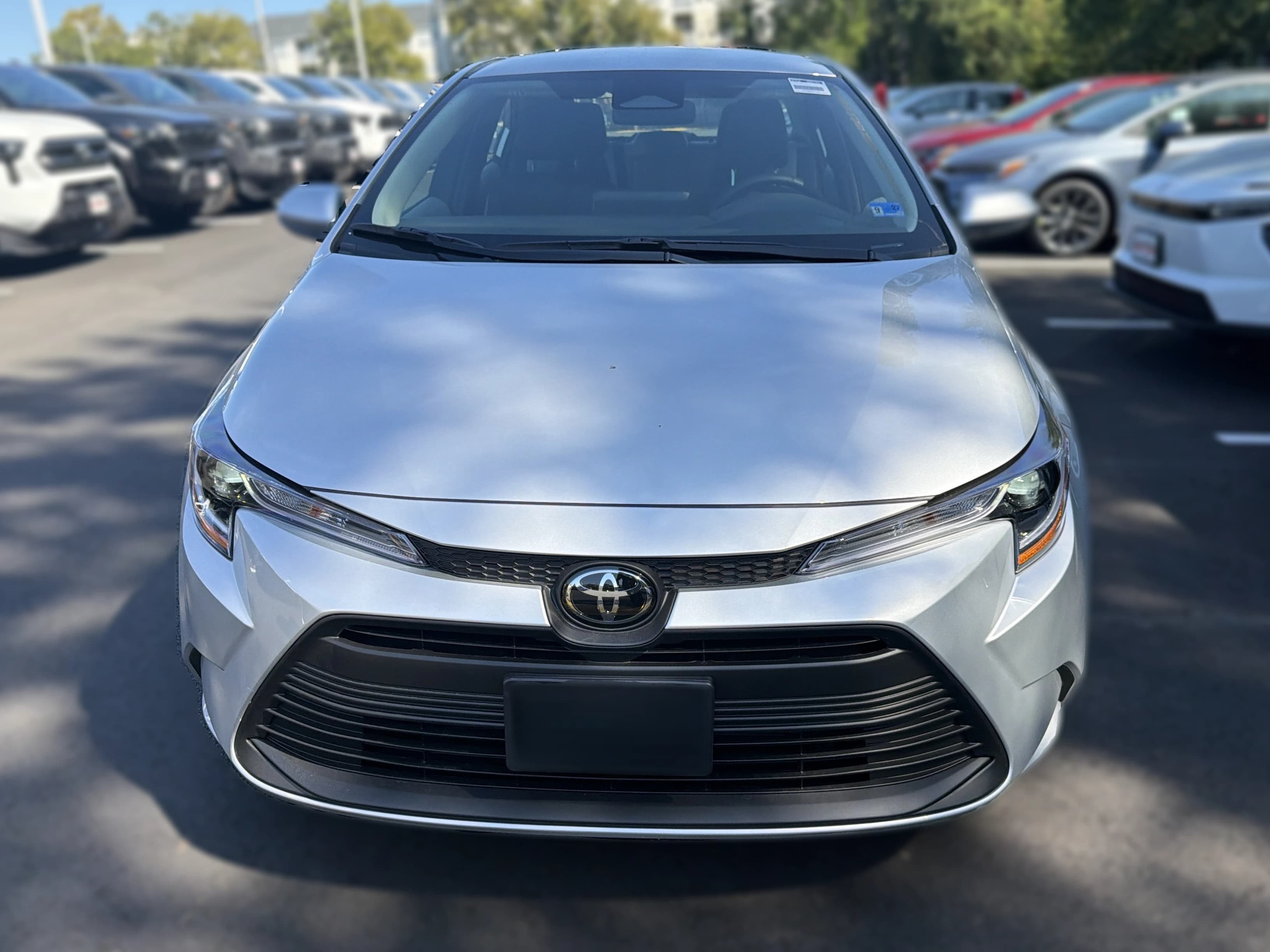 Toyota Corolla LE CVT (Natl) 2026 — side view