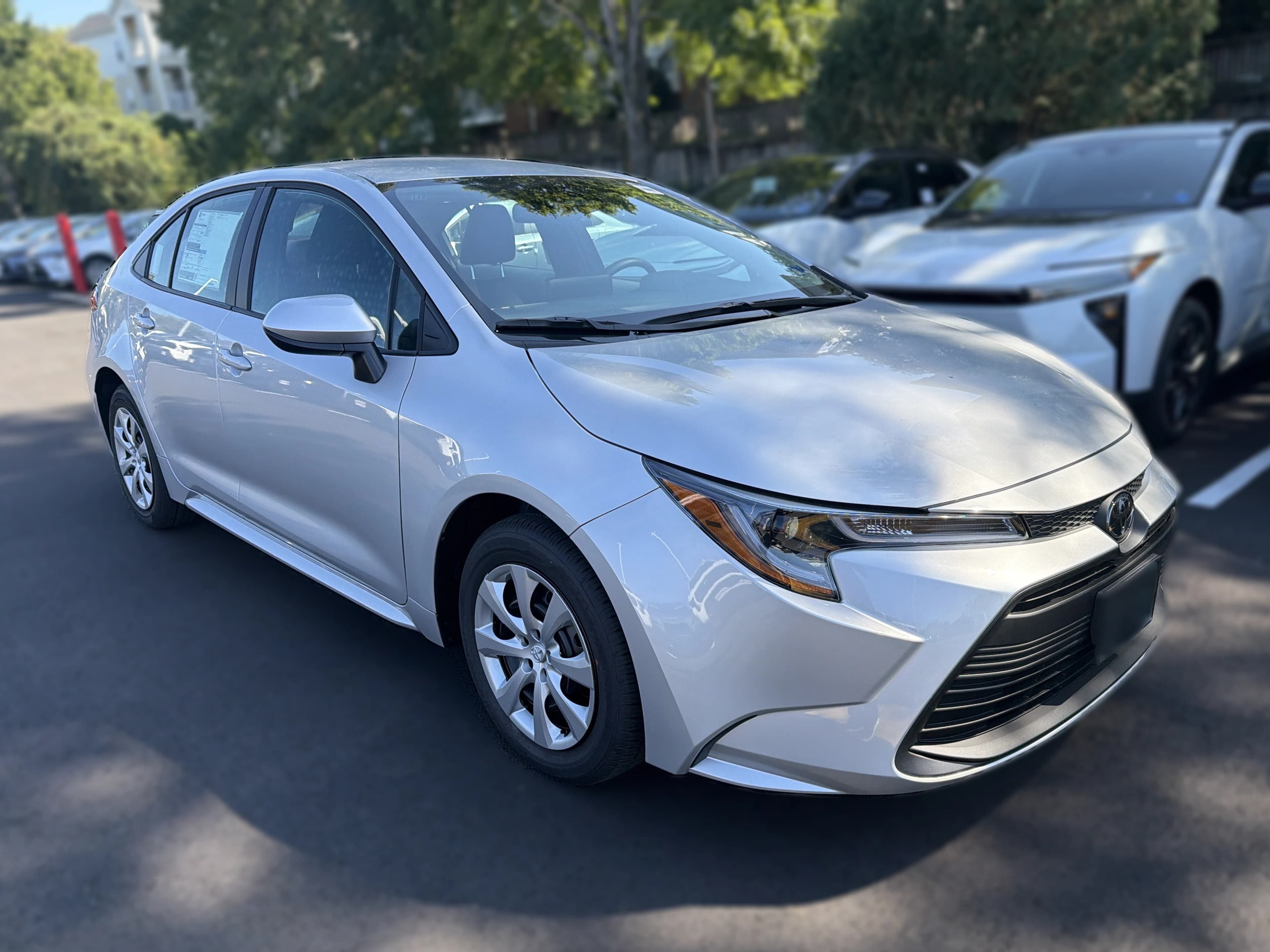 Toyota Corolla LE CVT (Natl) 2026 — side view