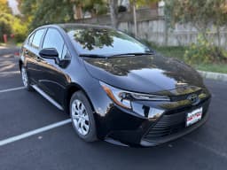 Toyota Corolla LE CVT (Natl) 2027 — side view