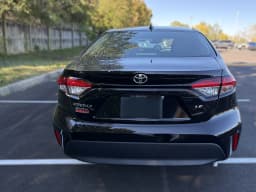 Toyota Corolla LE CVT (Natl) 2027 — side view