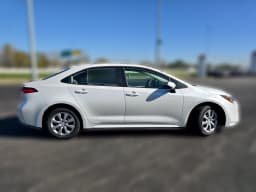 Toyota Corolla LE CVT (Natl) 2027 — side view
