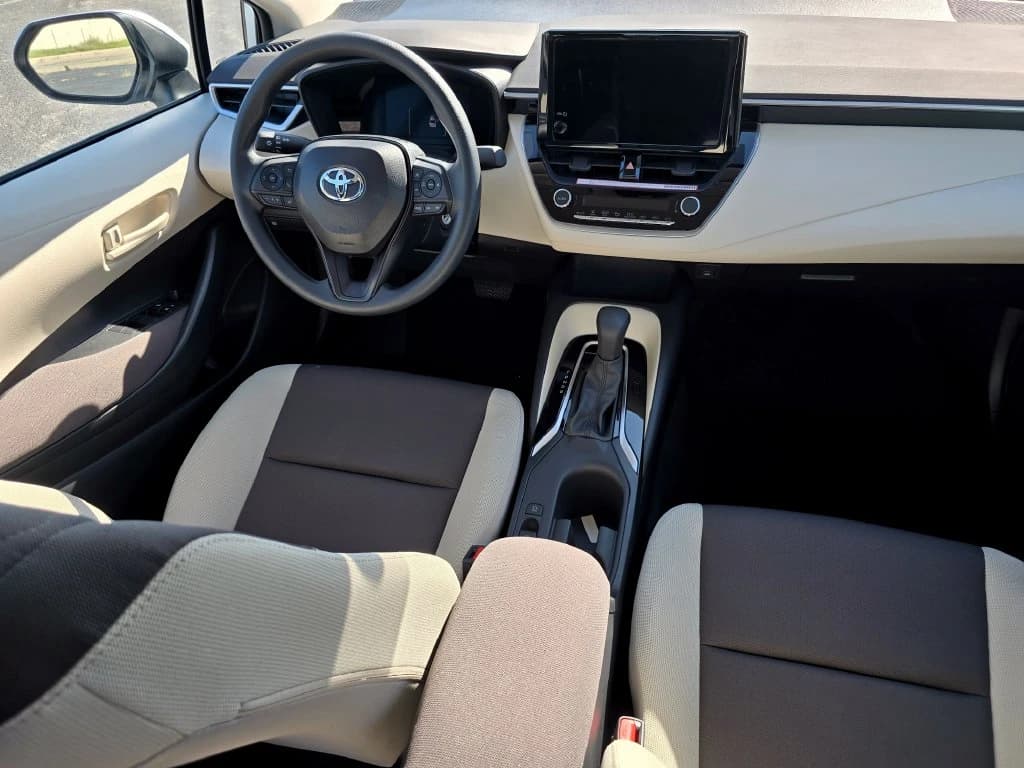 Toyota Corolla LE CVT (Natl) 2027 — side view