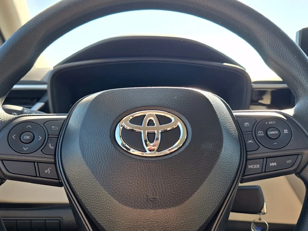 Toyota Corolla LE CVT (Natl) 2027 — side view