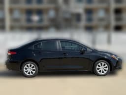 Toyota Corolla LE CVT (Natl) 2027 — side view