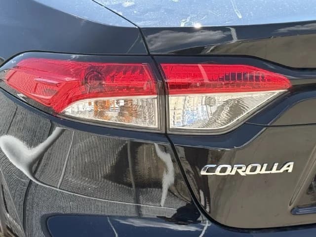Toyota Corolla LE CVT (Natl) 2027 — side view