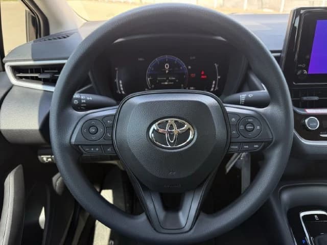 Toyota Corolla LE CVT (Natl) 2027 — side view