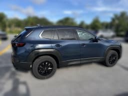 Mazda CX-50 Hybrid Premium AWD 2026 — side view