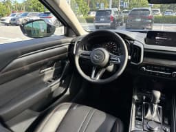Mazda CX-50 Hybrid Premium AWD 2026 — side view