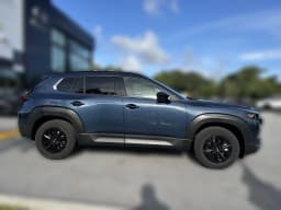 Mazda CX-50 Hybrid Premium AWD 2026 — side view