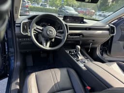 Mazda CX-50 Hybrid Premium AWD 2026 — side view