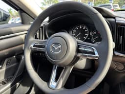Mazda CX-50 Hybrid Premium AWD 2026 — side view