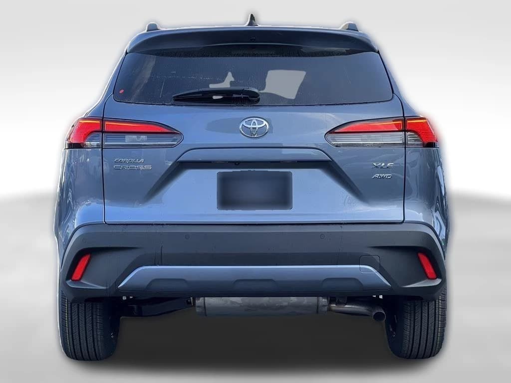 Toyota Corolla Cross XLE 4WD (Natl) 2026 — side view