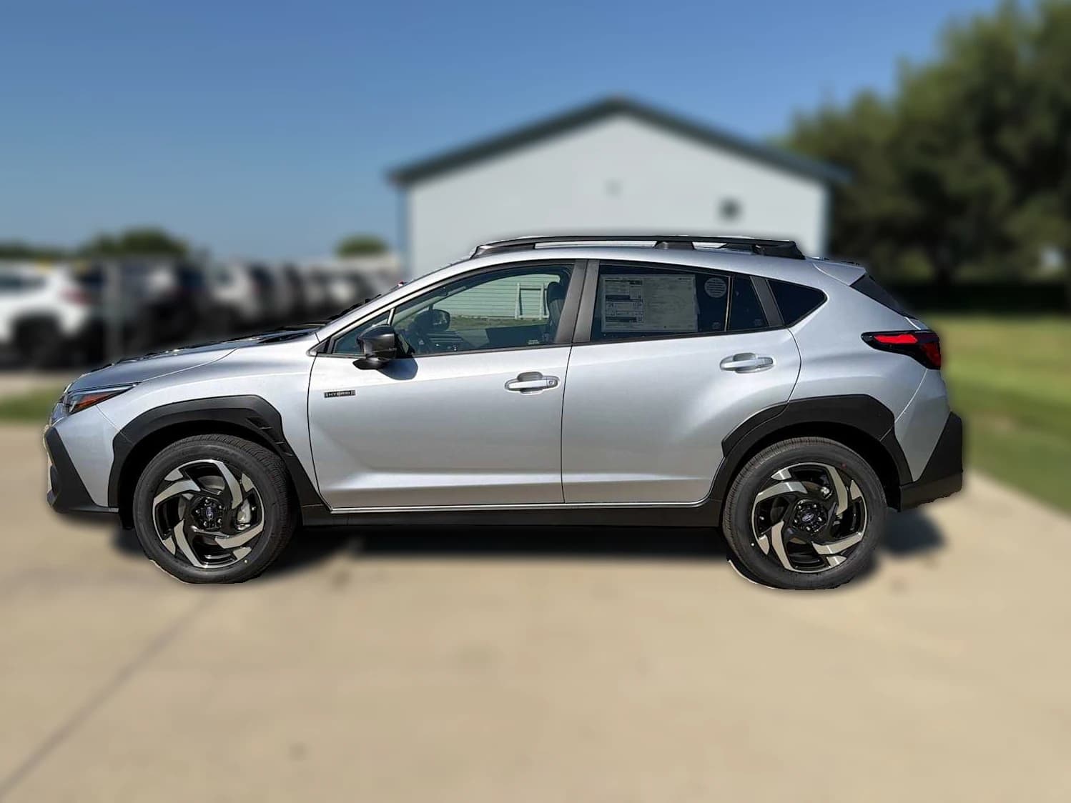 Subaru Crosstrek Limited Hybrid AWD 2026 — side view