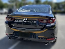 Mazda Mazda3 Sedan 2.5 S Carbon Edition AWD 2026 — side view