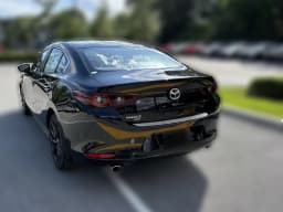 Mazda Mazda3 Sedan 2.5 S Carbon Edition AWD 2026 — side view
