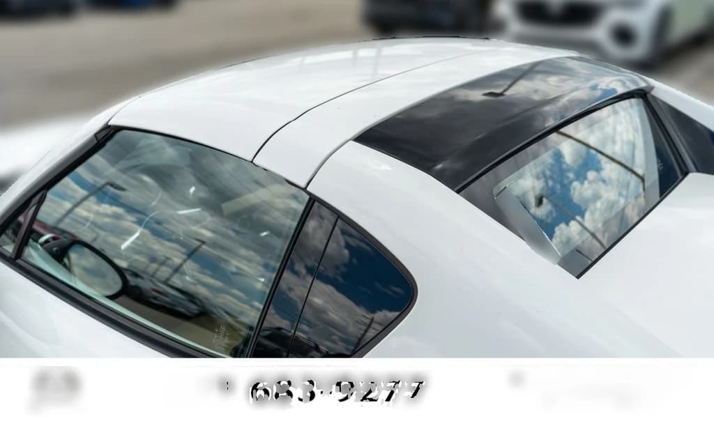 Mazda MX-5 Miata RF Grand Touring Auto 2026 — side view