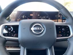 Nissan Armada Platinum 4x4 2027 — side view