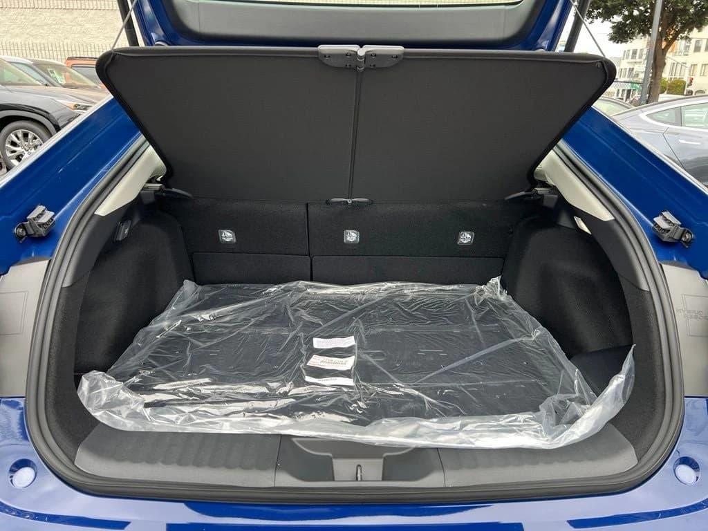 Toyota Prius Plug-In Hybrid SE (Natl) 2027 — side view