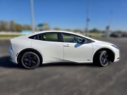 Toyota Prius LE AWD (Natl) 2027 — side view
