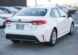 Toyota Corolla LE CVT (Natl) 2027 — side view