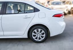 Toyota Corolla LE CVT (Natl) 2027 — side view