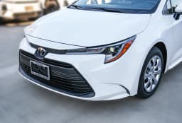 Toyota Corolla LE CVT (Natl) 2027 — side view