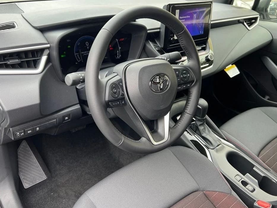 Toyota Corolla Hybrid SE AWD (Natl) 2026 — side view