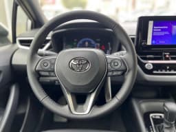 Toyota Corolla Hybrid SE AWD (Natl) 2026 — side view