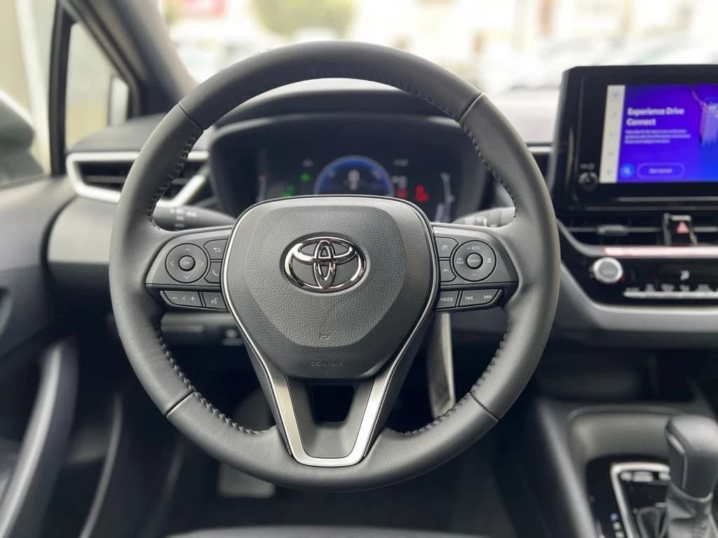 Toyota Corolla Hybrid SE AWD (Natl) 2026 — side view