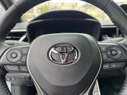 Toyota Corolla Hybrid SE AWD (Natl) 2026 — side view