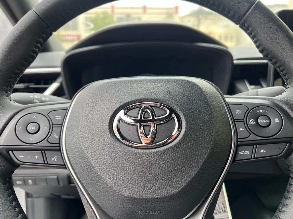 Toyota Corolla Hybrid SE AWD (Natl) 2026 — side view