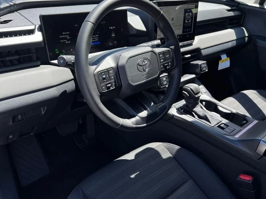 Toyota RAV4 Plug-In Hybrid SE (Natl) 2026 — side view